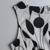 1950s White and Black Sleeveless Retro Polka Dot Belted Vintage Dress