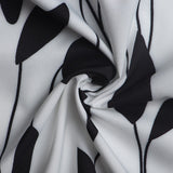 1950s White and Black Sleeveless Retro Polka Dot Belted Vintage Dress