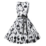 1950s White and Black Sleeveless Retro Polka Dot Belted Vintage Dress