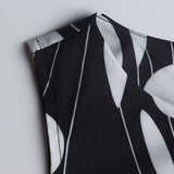 1950s White and Black Sleeveless Retro Polka Dot Belted Vintage Dress