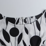 1950s White and Black Sleeveless Retro Polka Dot Belted Vintage Dress