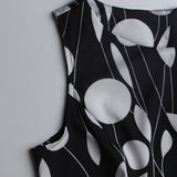 1950s White and Black Sleeveless Retro Polka Dot Belted Vintage Dress